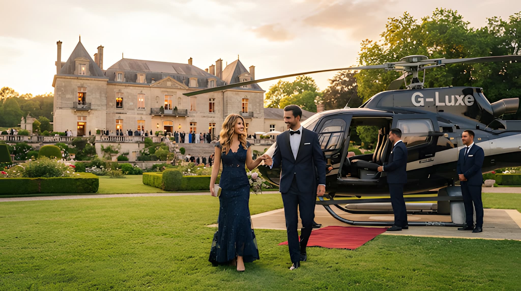 Guests arriving beside a helicopter at an outdoor event